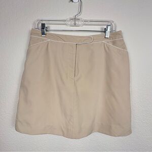 Izod Tan Skort with white accents and pockets